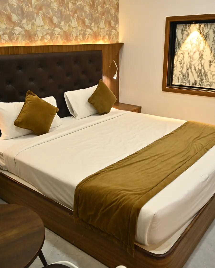 Guest room at Hotel Varnika Grand